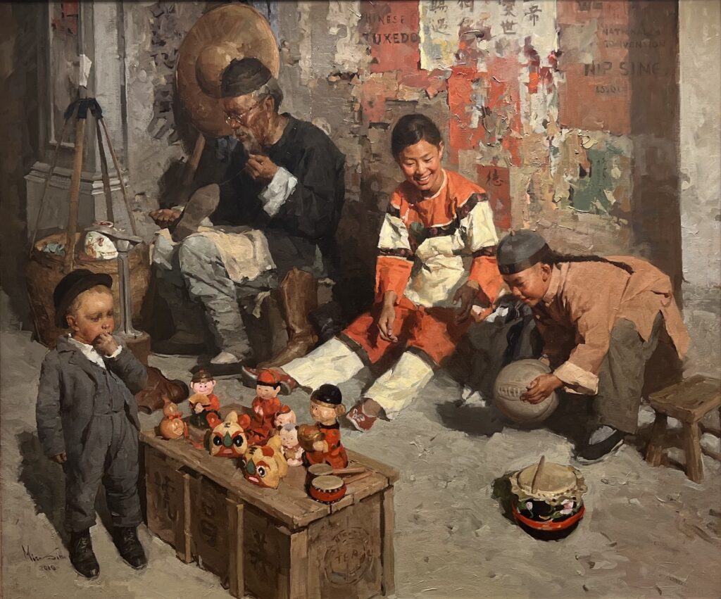 A painting of an elderly Chinese man in black, a smiling Chinese woman in red and white, and a young Chinese boy in beige and a braid sit on in a street stall and sell trinkets. A small American boy in a hat inspects the stall.