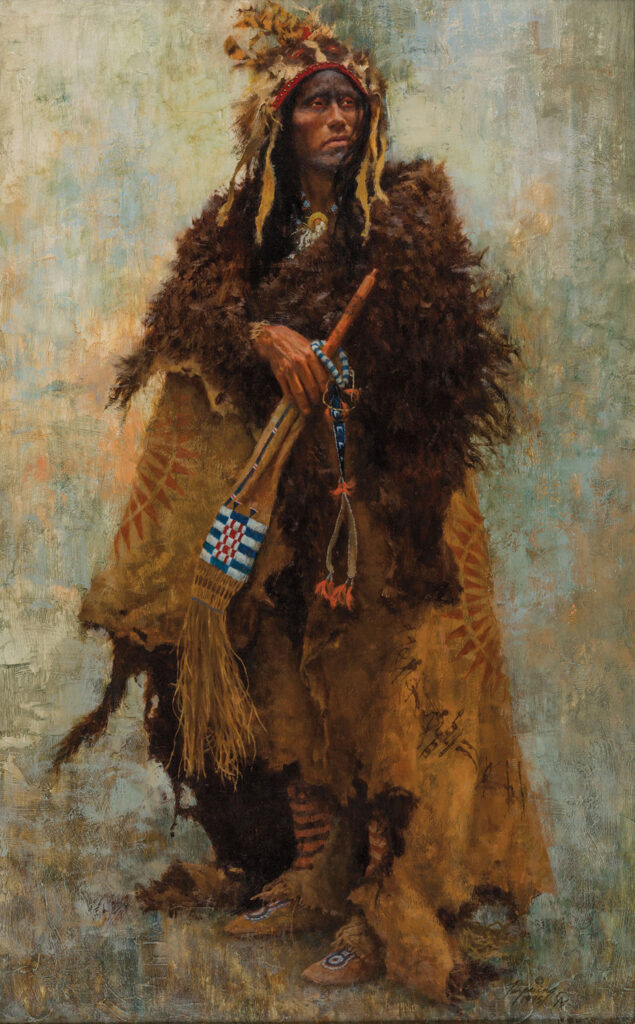 A person at the Native Life Gallery wears traditional Native American clothing, holding a flute, draped in fur and patterned textiles, with beaded accessories and a feathered headdress.