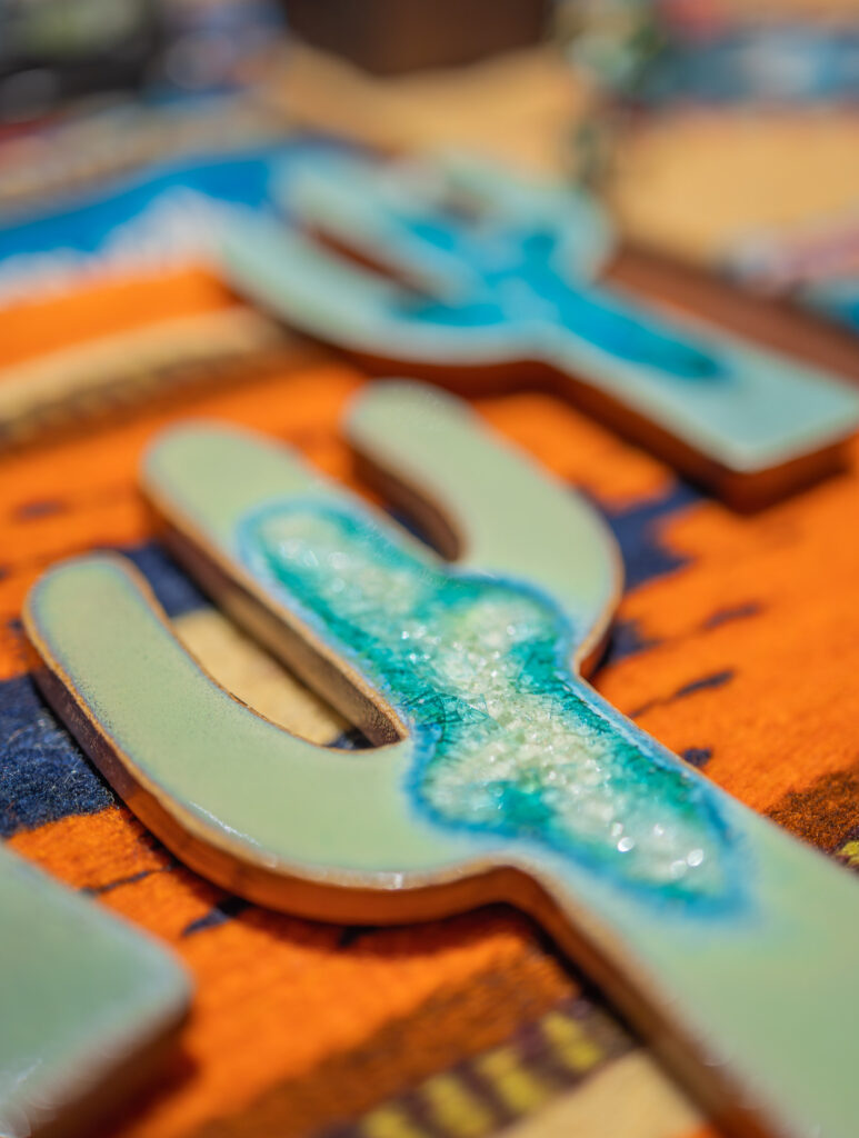 A close-up of a decorative ceramic cactus.