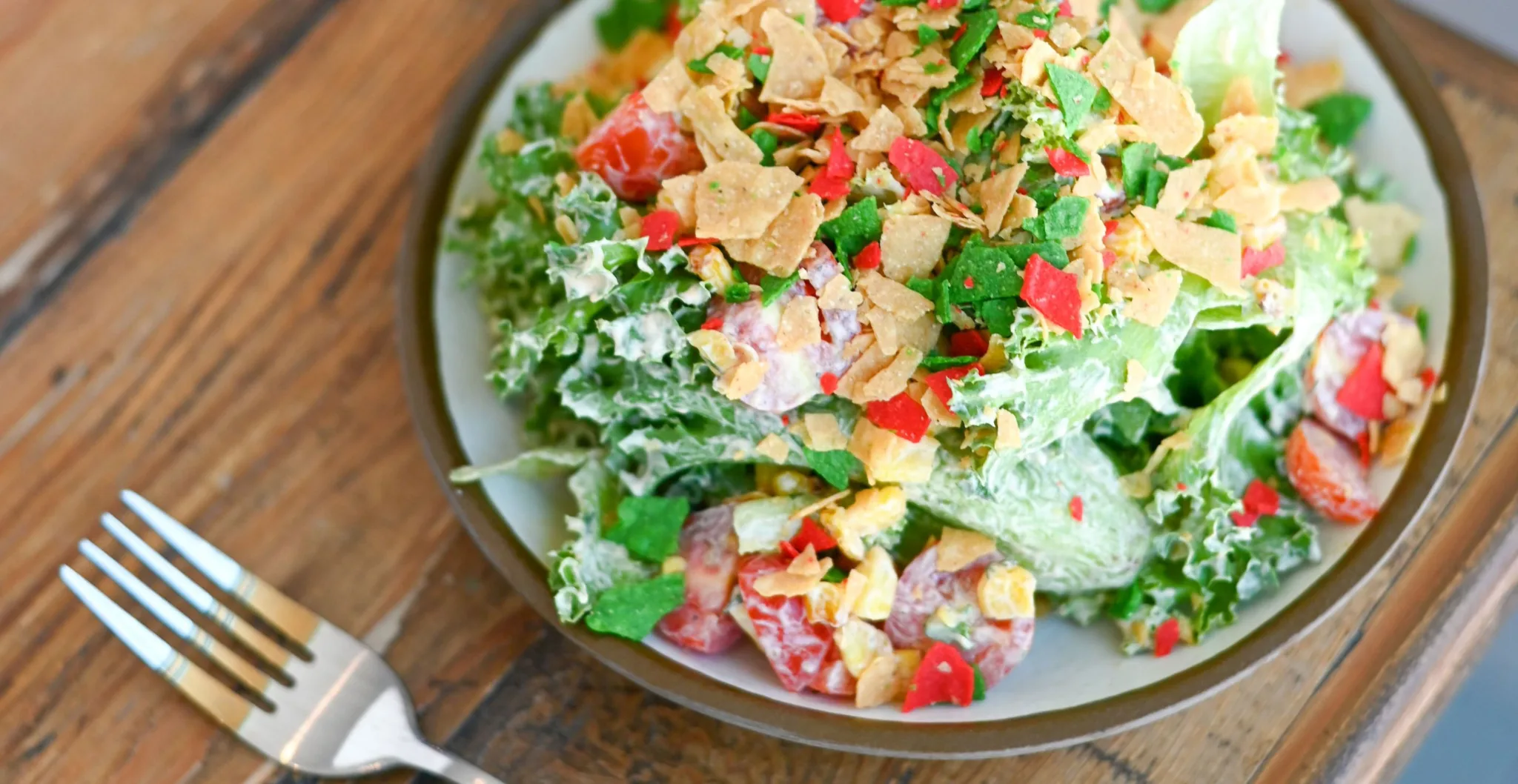 Southwest Salad from the Canyon Cafe with colorful crispy tortilla chip strips and cherry tomatoes.